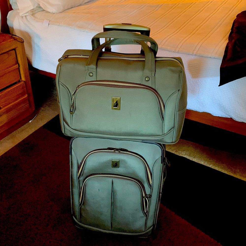 Used matching olive green London Fog carry-on weekender luggage set